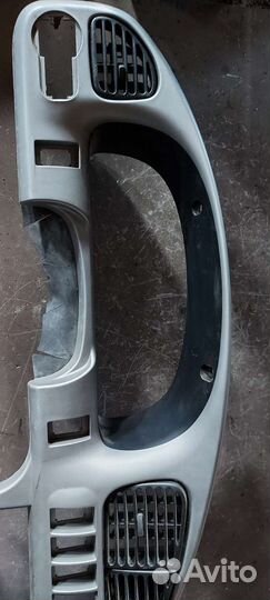 Центральная накладка Торпеда на Kia Shuma