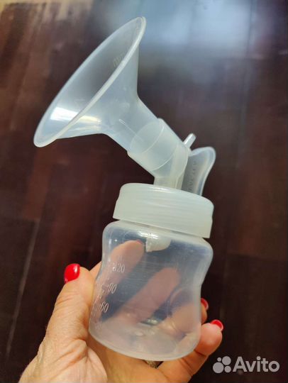 Молокоотсос medela электрический