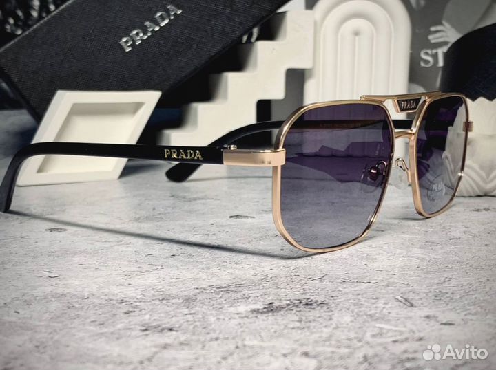 Очки Prada золотые