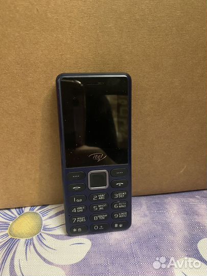 Телефон кнопочный
