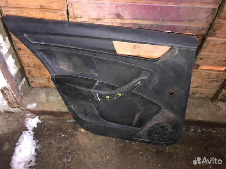Обшивка двери задняя левая Skoda Rapid