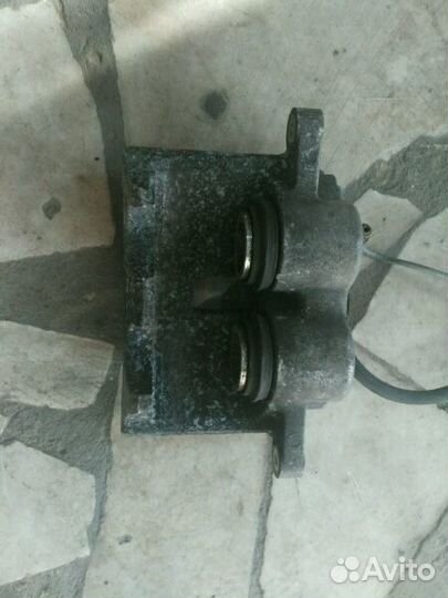 Суппорт тормозной Cadillac SRX I 2003-2009