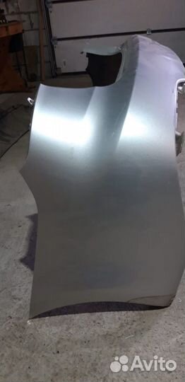 Задний бампер на Kia Cerato 2013