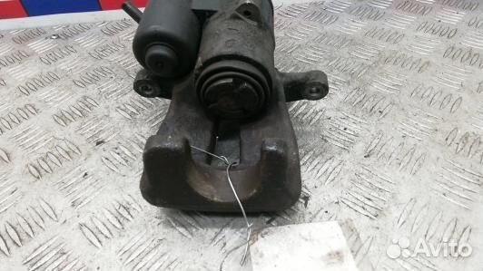 Суппорт тормозной задний левый volkswagen passat B