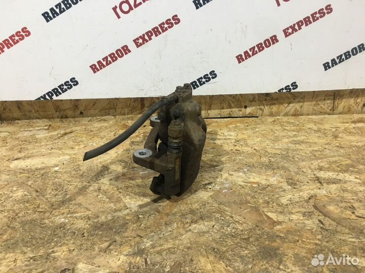 Суппорт тормозной передний левый Skoda Octavia A7