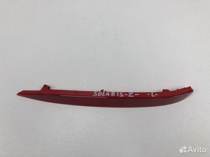 Отражатель в бампер задний левый Hyundai Solaris 2