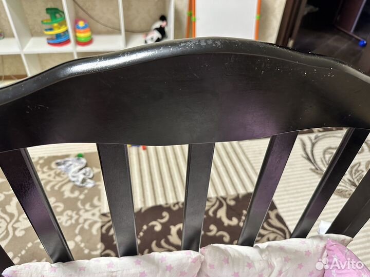 Детская кроватка с маятником