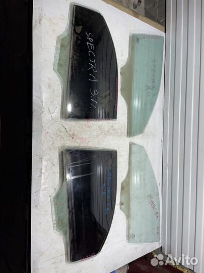 Стекло двери (Kia Spectra)