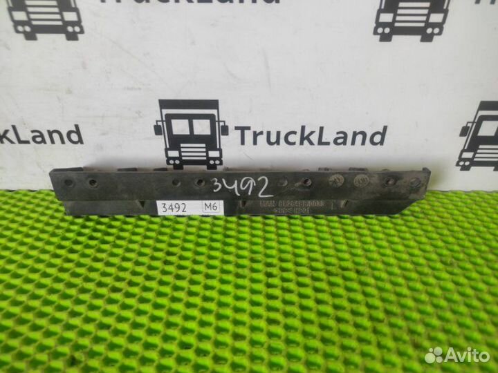 Кронштейн бачка омывателя левый Man Tgx