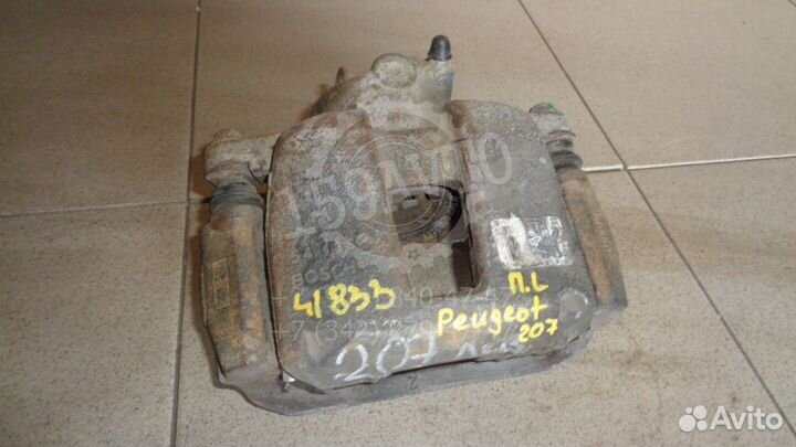 Суппорт передний левый Peugeot 207