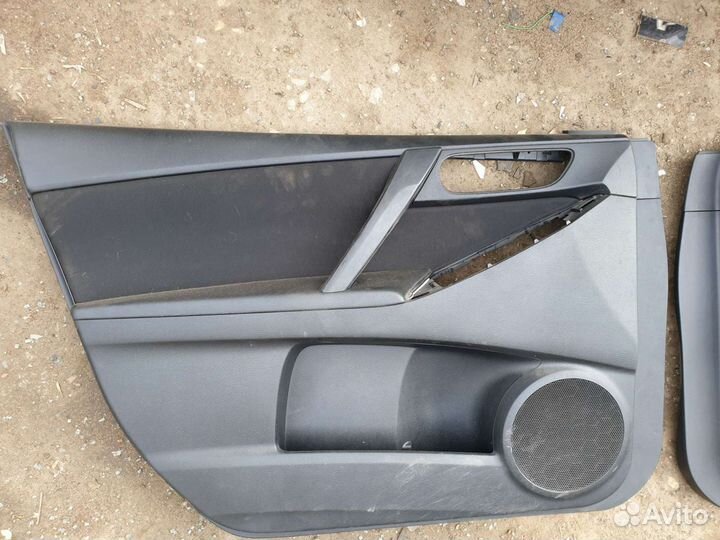 Обшивка дверей Mazda 3 BL