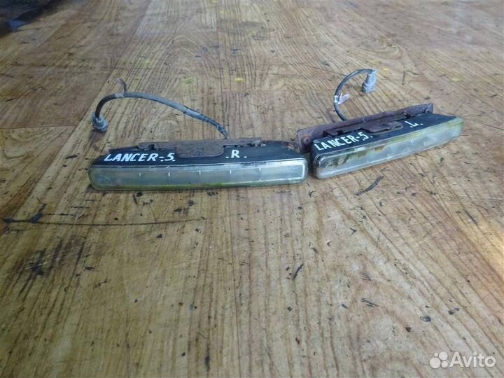 Фара противотуманная (к-т) Mitsubishi Lancer (C6)