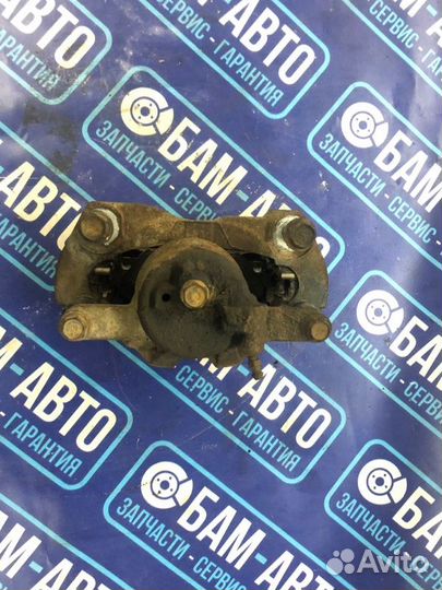 Суппорт тормозной передний левый Toyota Corolla