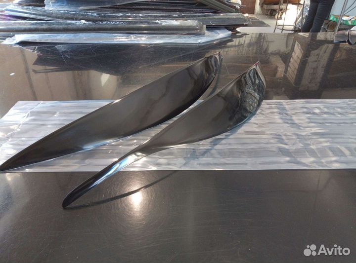 Реснички на фары Renault Fluence