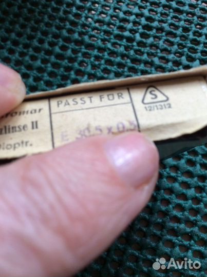 Запасная линза на объектив