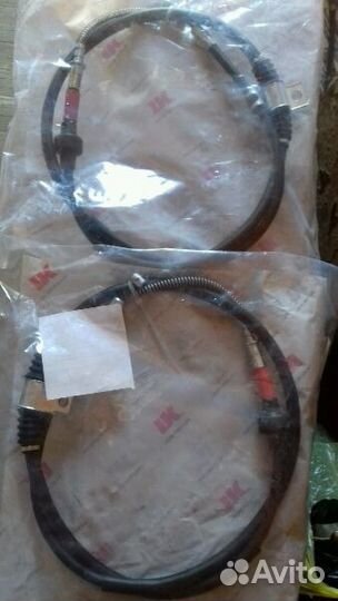 Трос стояночного тормоза на Мицубиси ланцер 10