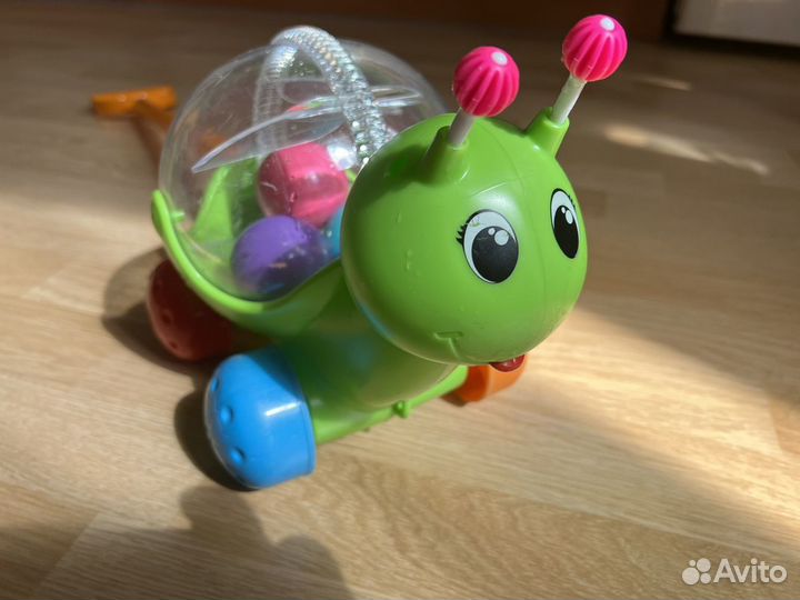 Улитка игрушка детская на колесиках