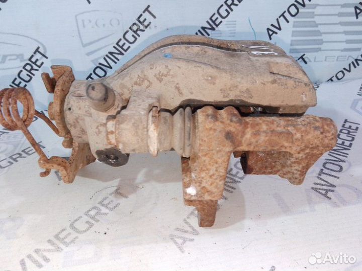 Суппорт тормозной задний левый Geely Emgrand EC7