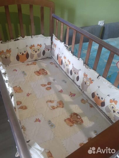 Детская кроватка с поперечным маятником