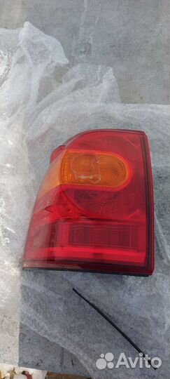 Левый фонарь lend cruiser 200 рест