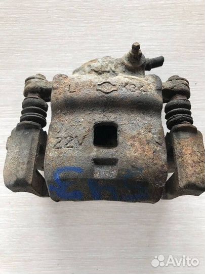 Суппорт передний левый Nissan Almera 1