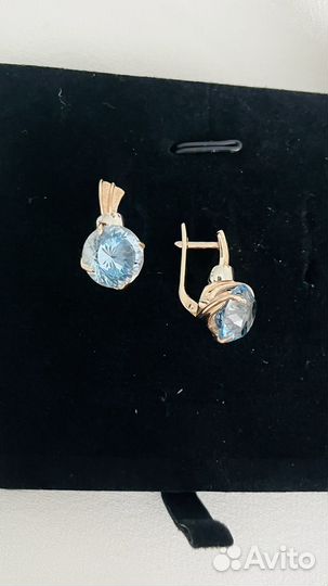 Золотые серьги с топазами 585