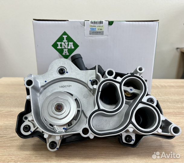 Помпа с термостатом INA 538036310 1.4/1.6