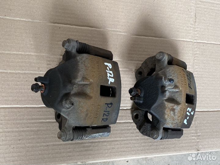 Nissan Primera p12 передний суппорт L-R