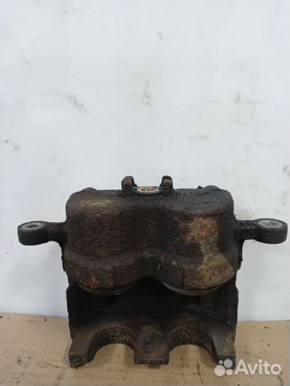 Суппорт тормозной передний Ssangyong Actyon Sports