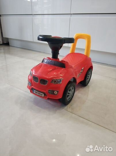 Детский автомобиль каталка