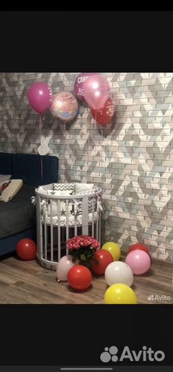 Детская кроватка с маятником