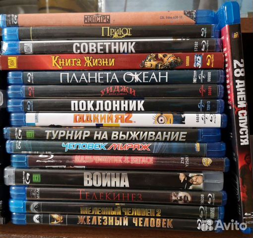Блюрей диски с фильмами. Бронзовение Blu ray дисков фото