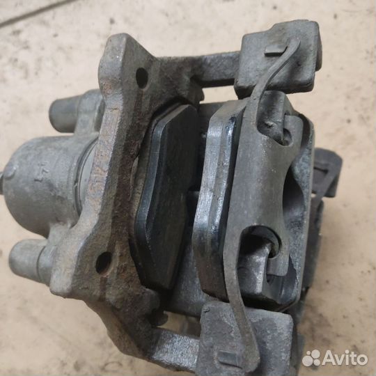 Суппорт тормозной задний BMW E39