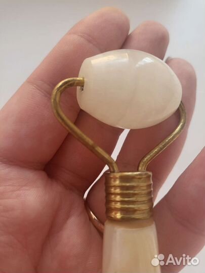 Роликовый массажер для лица оникс