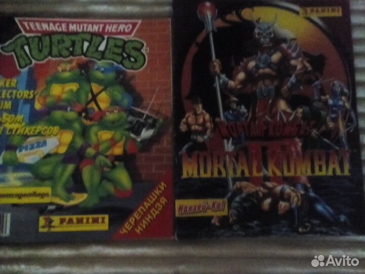 Альбомы наклеек panini