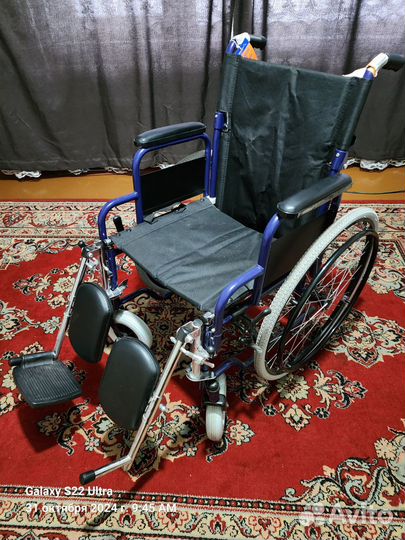 Инвалидная коляска