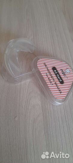 Ортодонтический брекет, капа