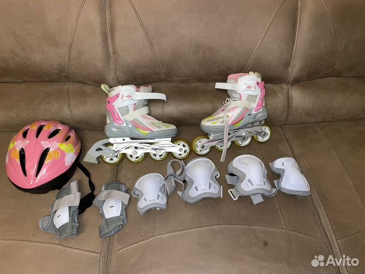 Роликовые коньки