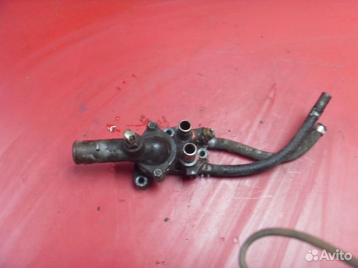 Корпус термостата 1632315180 Toyota Corolla Ceres