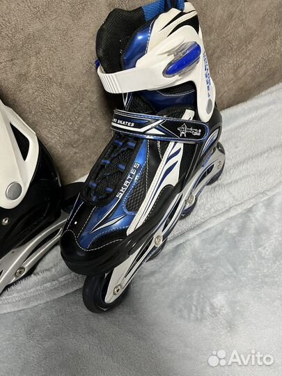 Роликовые коньки