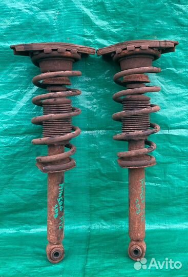 Задние стойки Nissan Primera P12