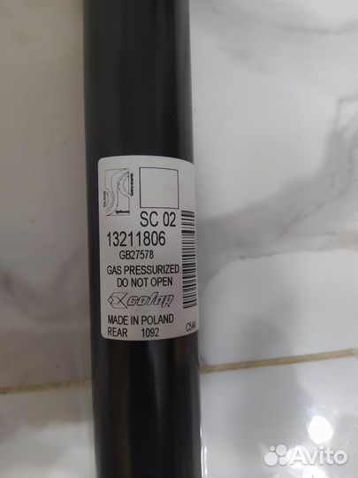 Амортизатор подвески левый на Opel Corsa D