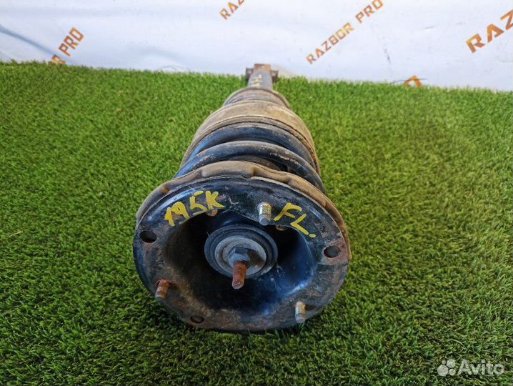 Амортизатор передний левый Nissan Primera P11