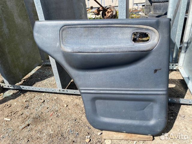 Обшивка двери задняя левая Kia Sportage