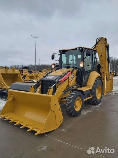 Экскаватор погрузчик CAT