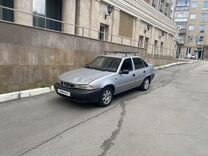 Daewoo Nexia 1.5 MT, 2000, 394 108 км, с пробегом, цена 123 000 руб.