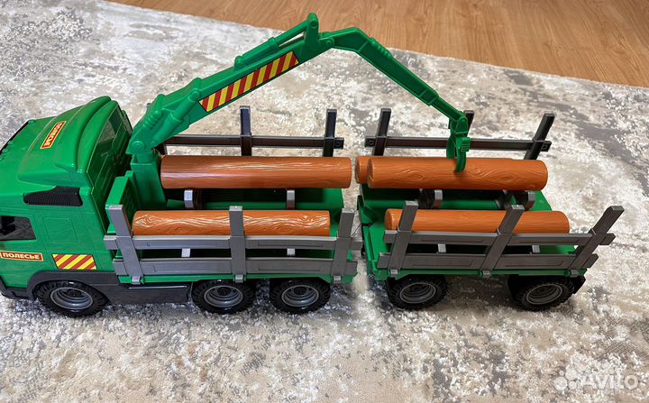 Машина лесовоз с прицепом полесье