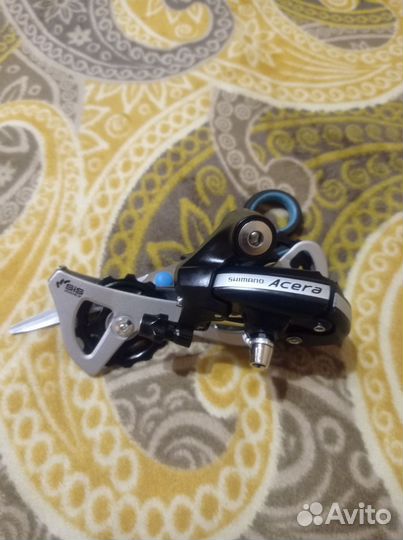 Переключатель задний для горного велосипеда