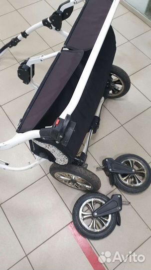 Детская коляска. Ремонт фиксатора колеса