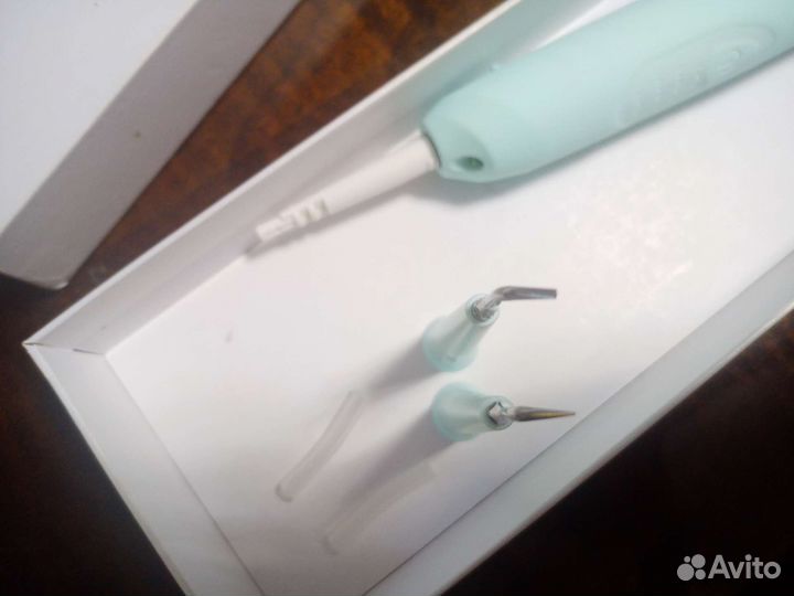 Ультразвуковой прибор для чистки зубов